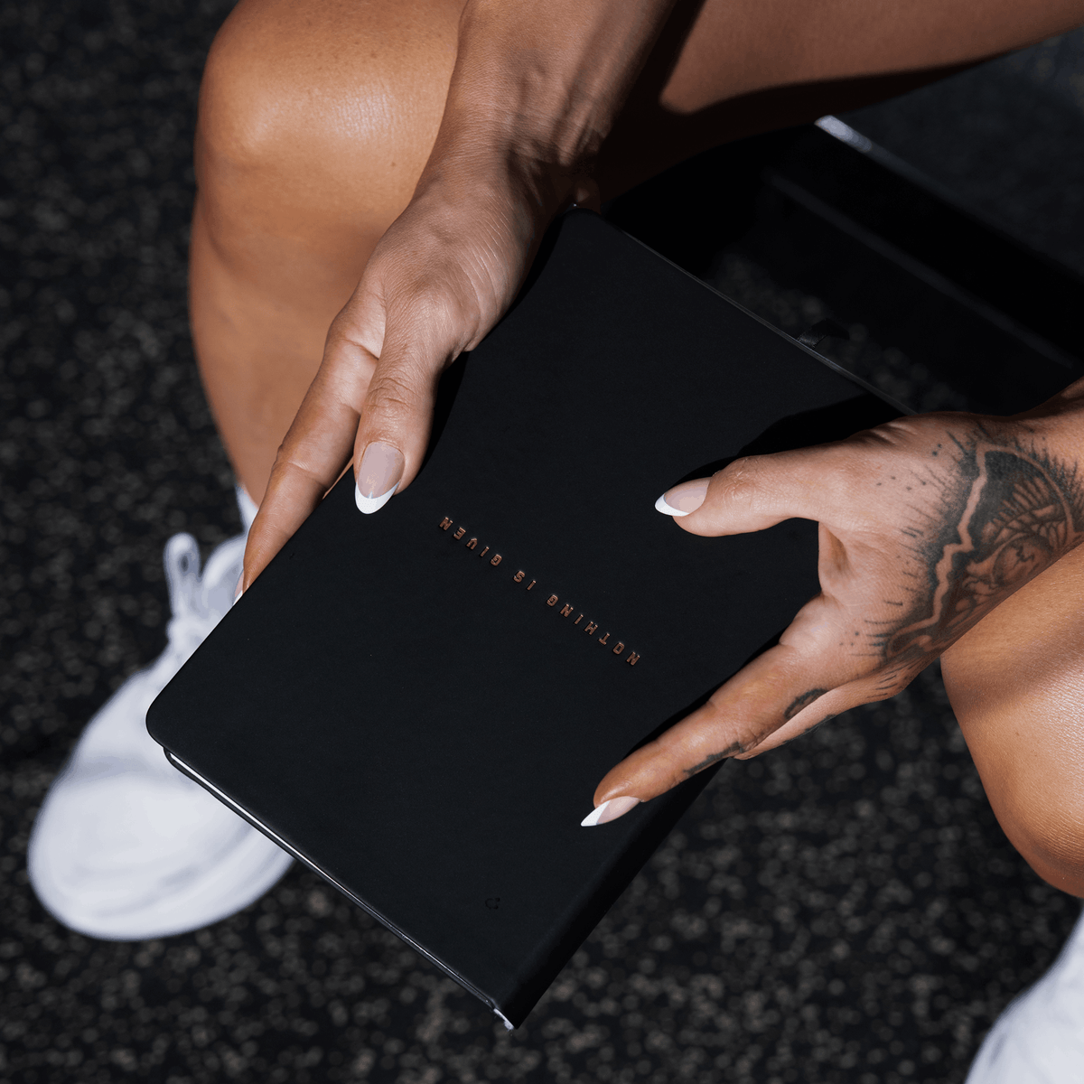 Women's Workout Journal in Black – Lifestyle, Front Cover