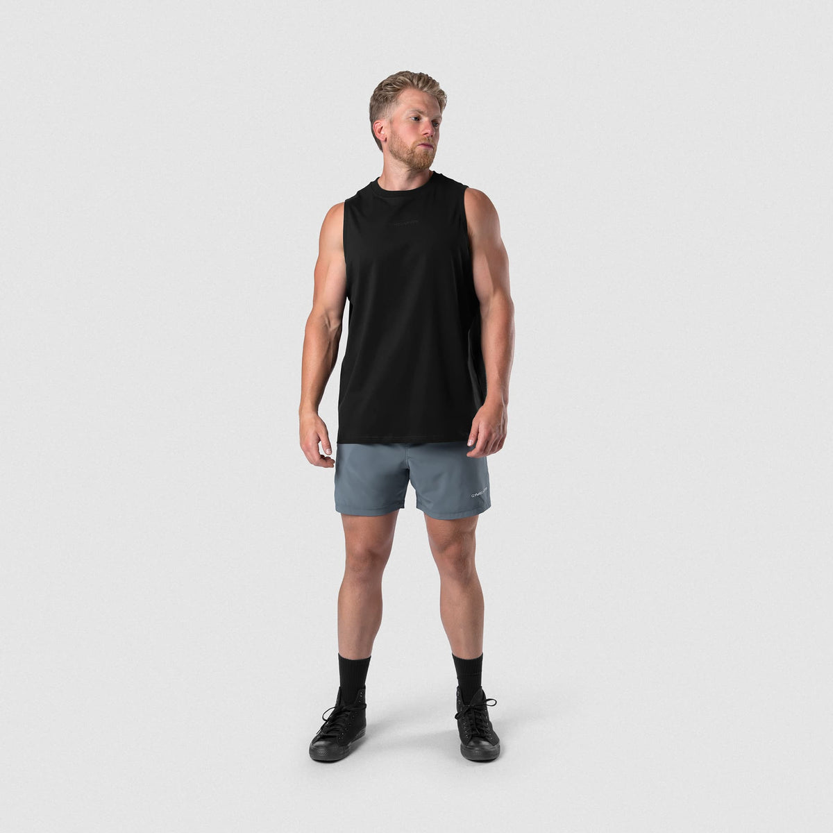 Male model wearing the Axis 6" Lined Shorts - Lake full-body view