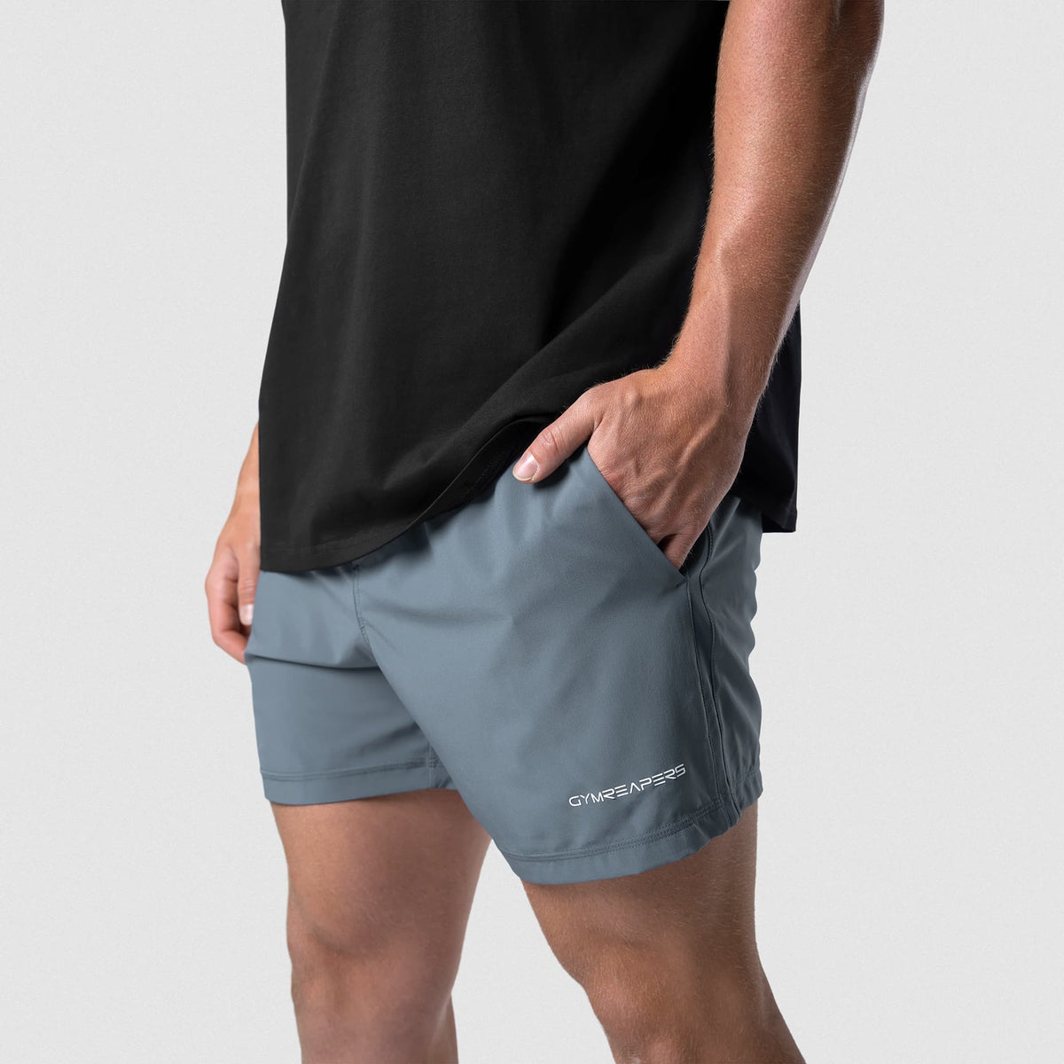 Male model wearing the Axis 6" Lined Shorts - Lake front view