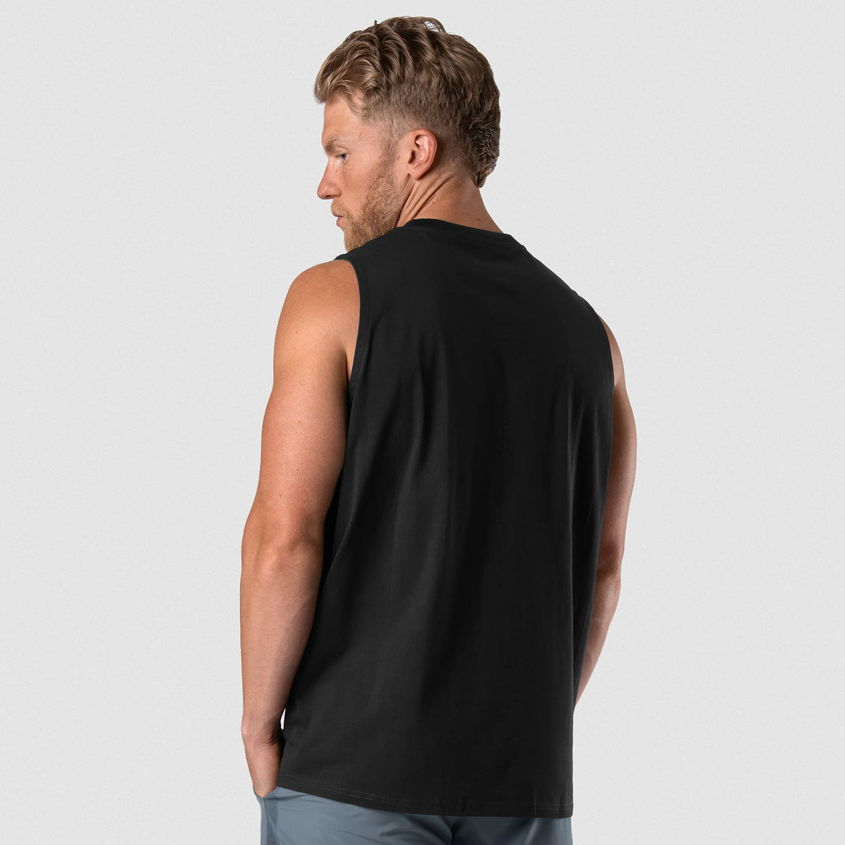Man wearing Axis Muscle Tank - Black/Black back fit
