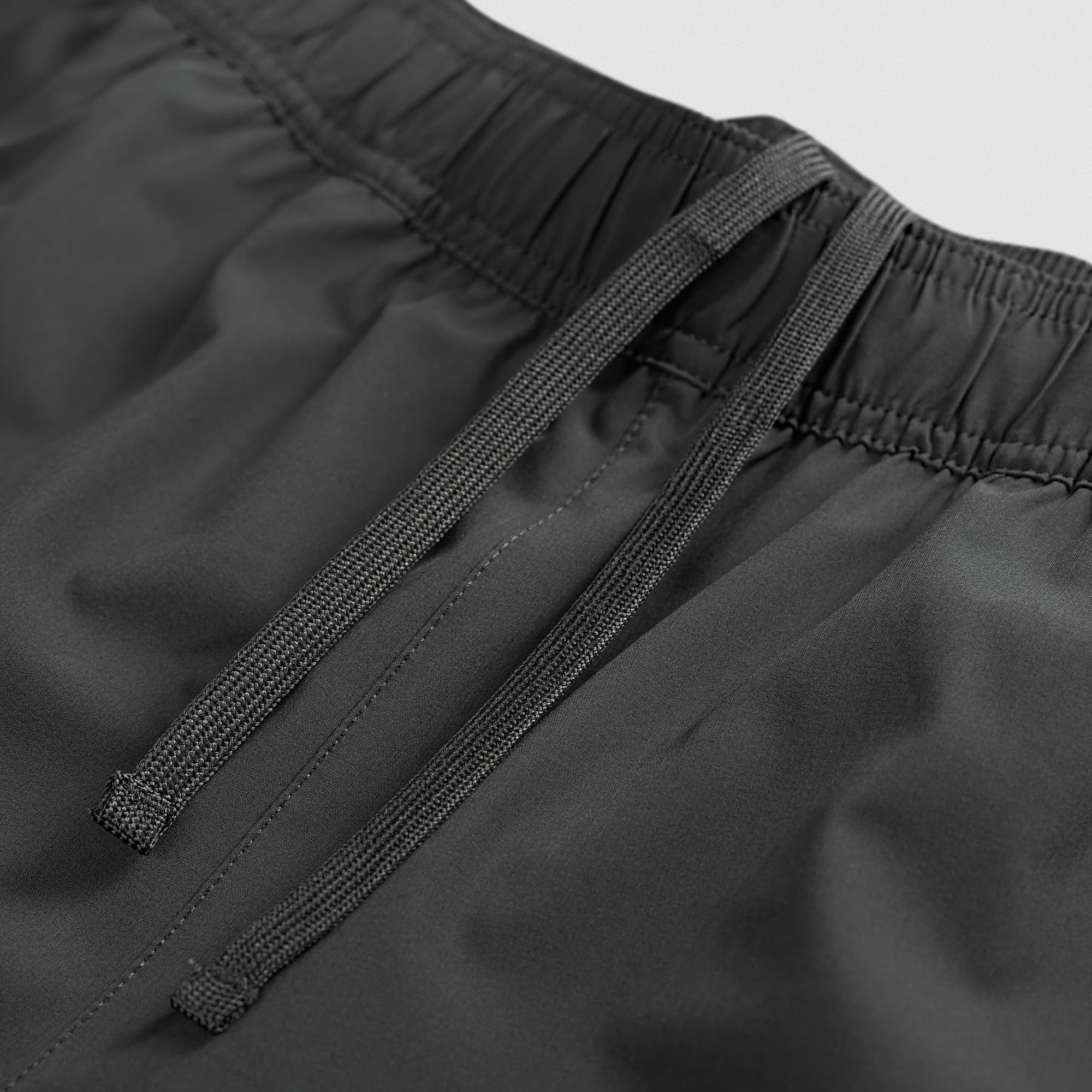 Stretch woven fabric detail on Men's Conquer 5 Inch Shorts - Dark Gray
