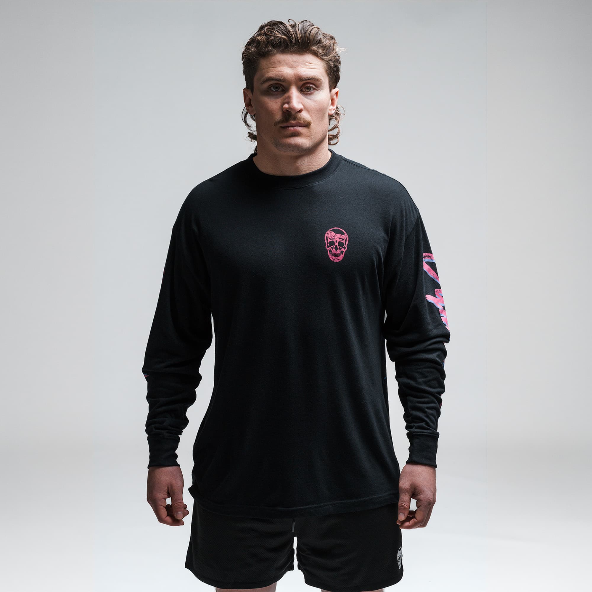 Athlete wearing the Moon Breaker Long Sleeve Shirt half body shot front side