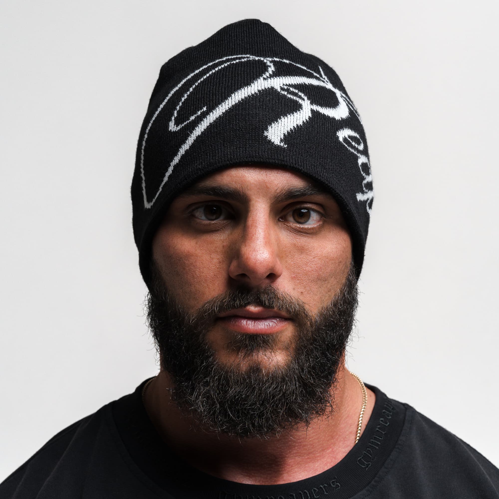 Athlete wearing Reapers Skull Cap Beanie - Black/White front view