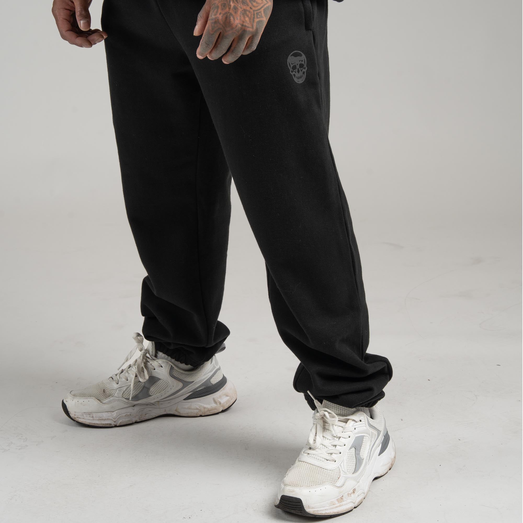 athlete wearing heavyweight joggers black black shot of legs