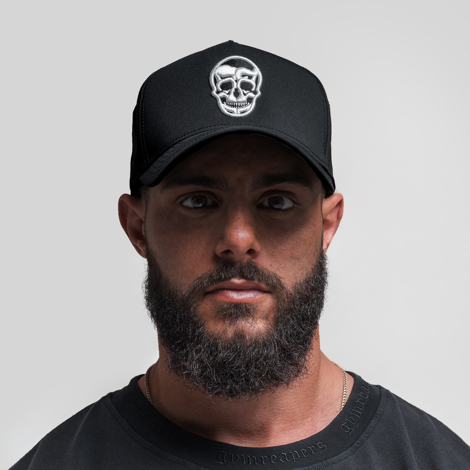 Athlete wearing Hybrid Performance 5-Panel Hat - Black/White front view