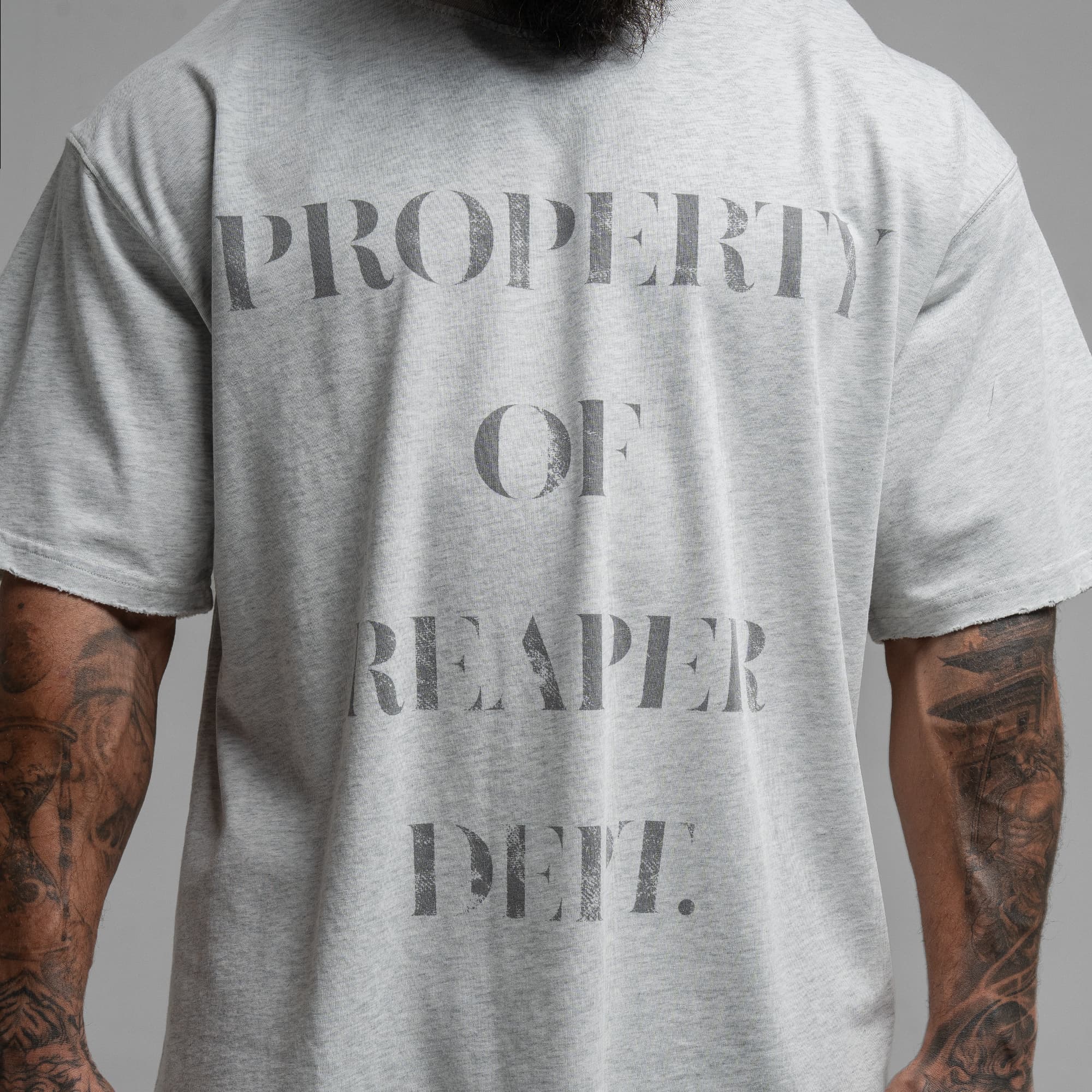 Athlete wearing Reaper Dept. Tee close up shot of front graphic