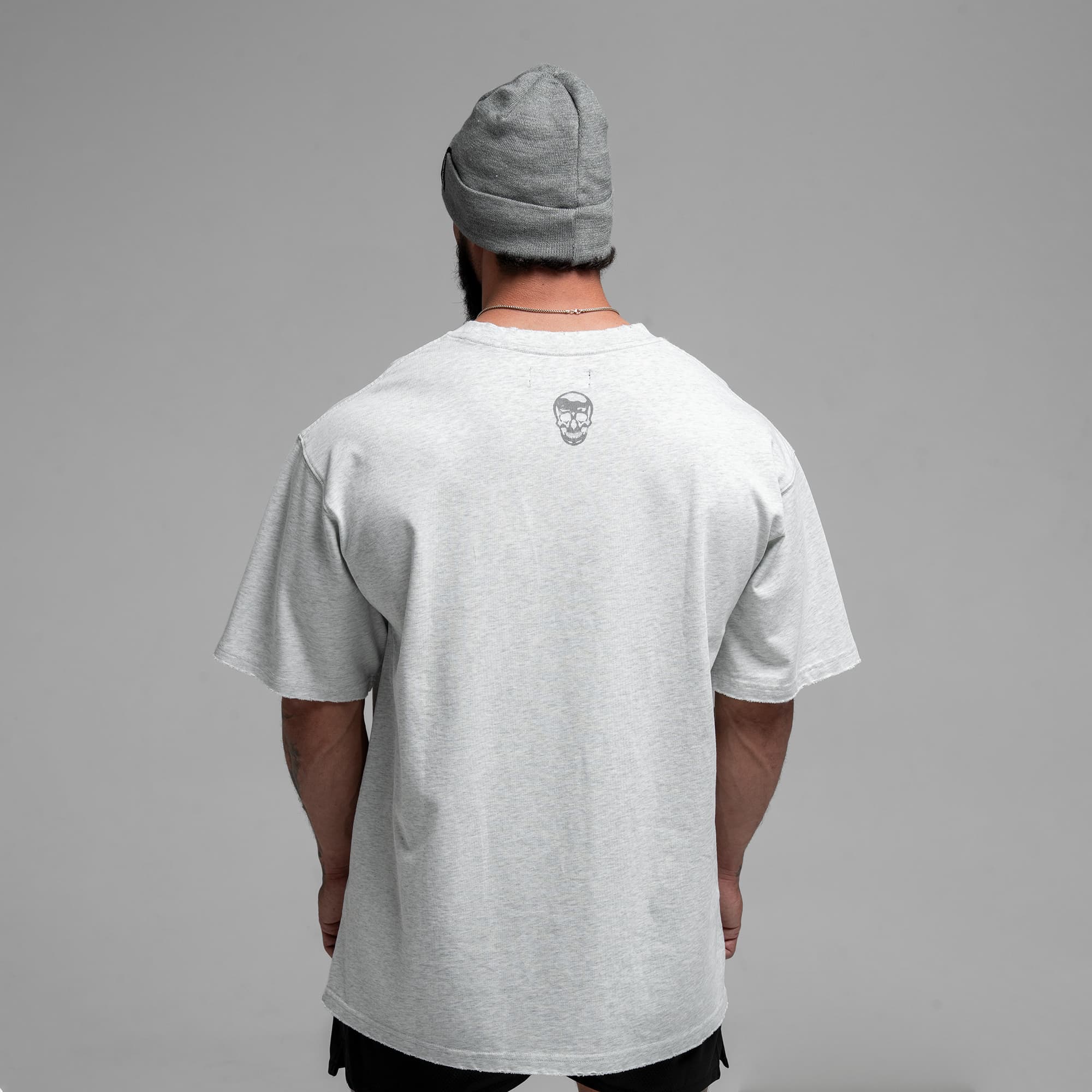 Athlete wearing Reaper Dept. Tee half body shot back view