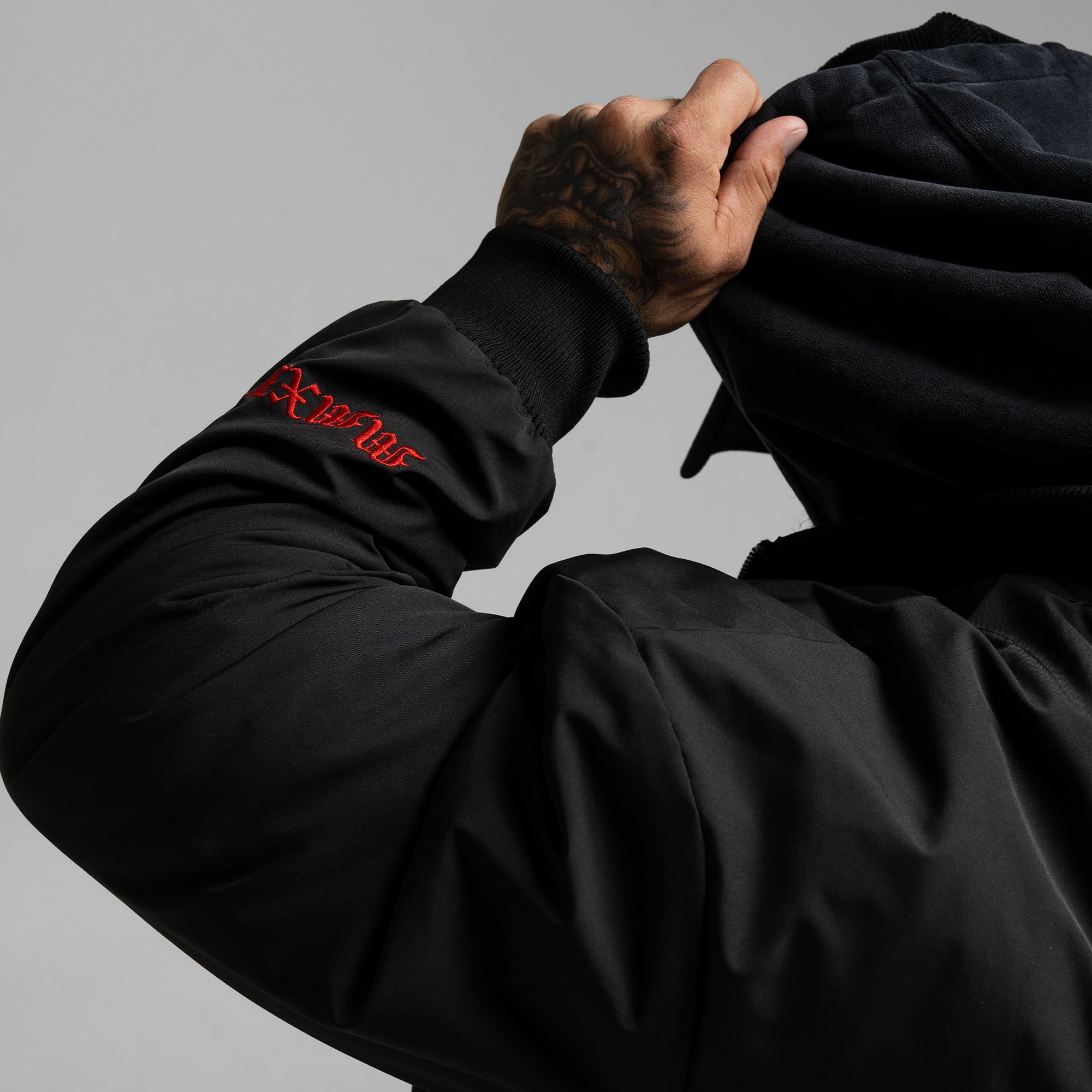 Athlete wearing the Ohio Bomber Jacket close up shot of sleeve graphic