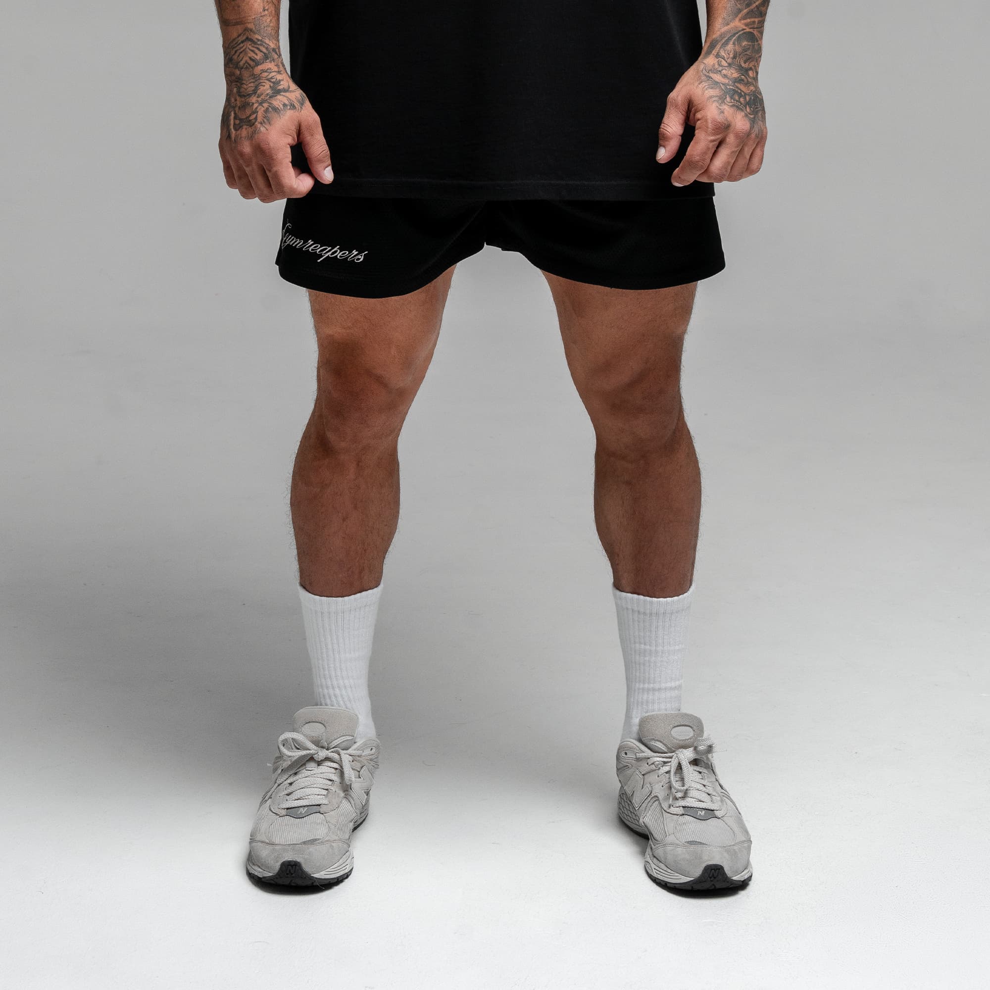 Athlete wearing Reaper Script Mesh Shorts main image