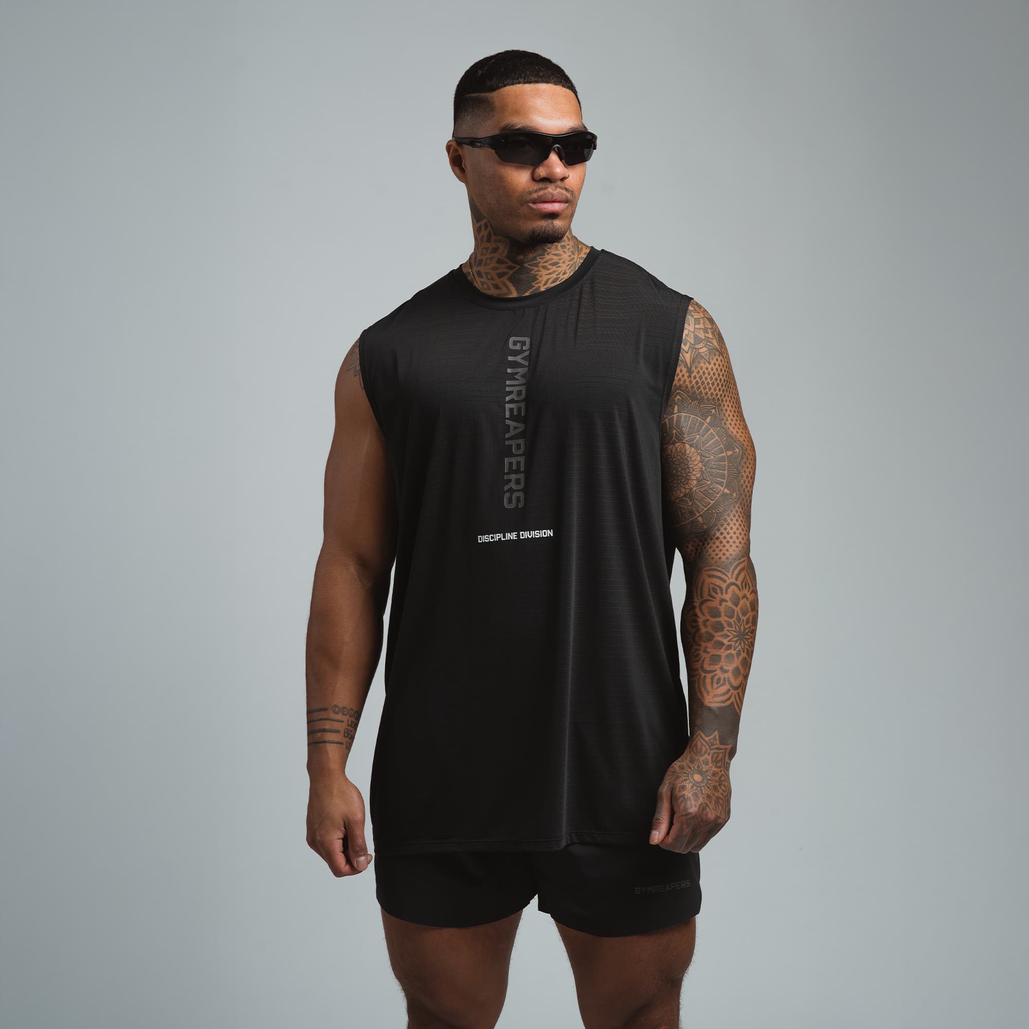 discipline division graphic tank top front full view of athlete