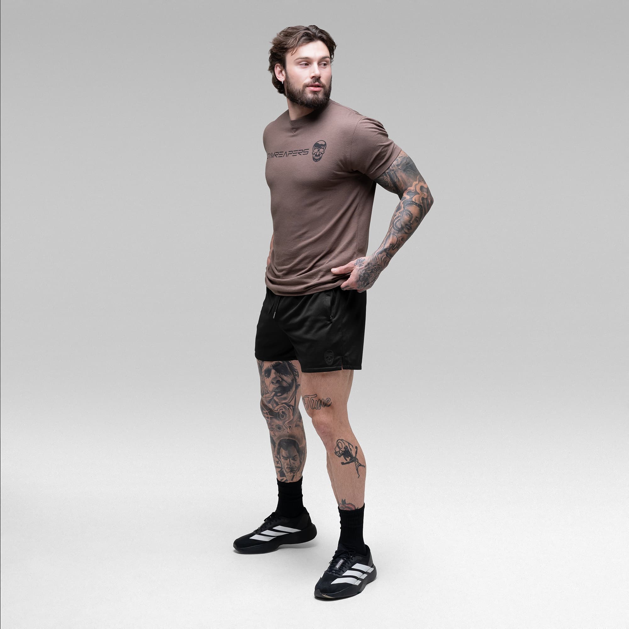 Athlete wearing the Black/Black Core Skull Mesh Training Shorts full body shot
