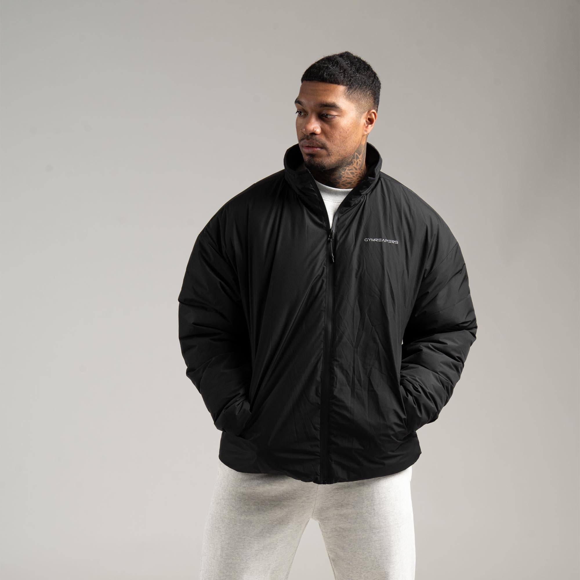 athlete wearing the Arktik Puffer Jacket front view