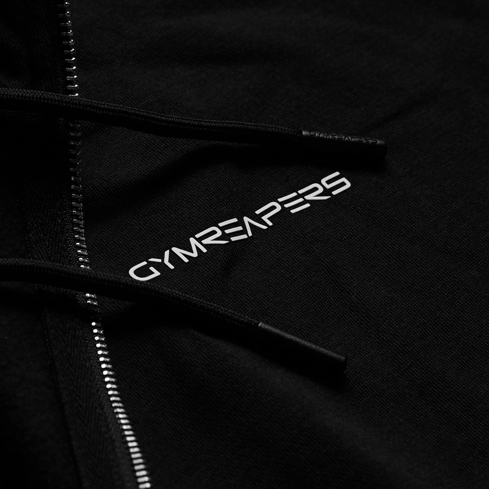 axis zip up black white detail