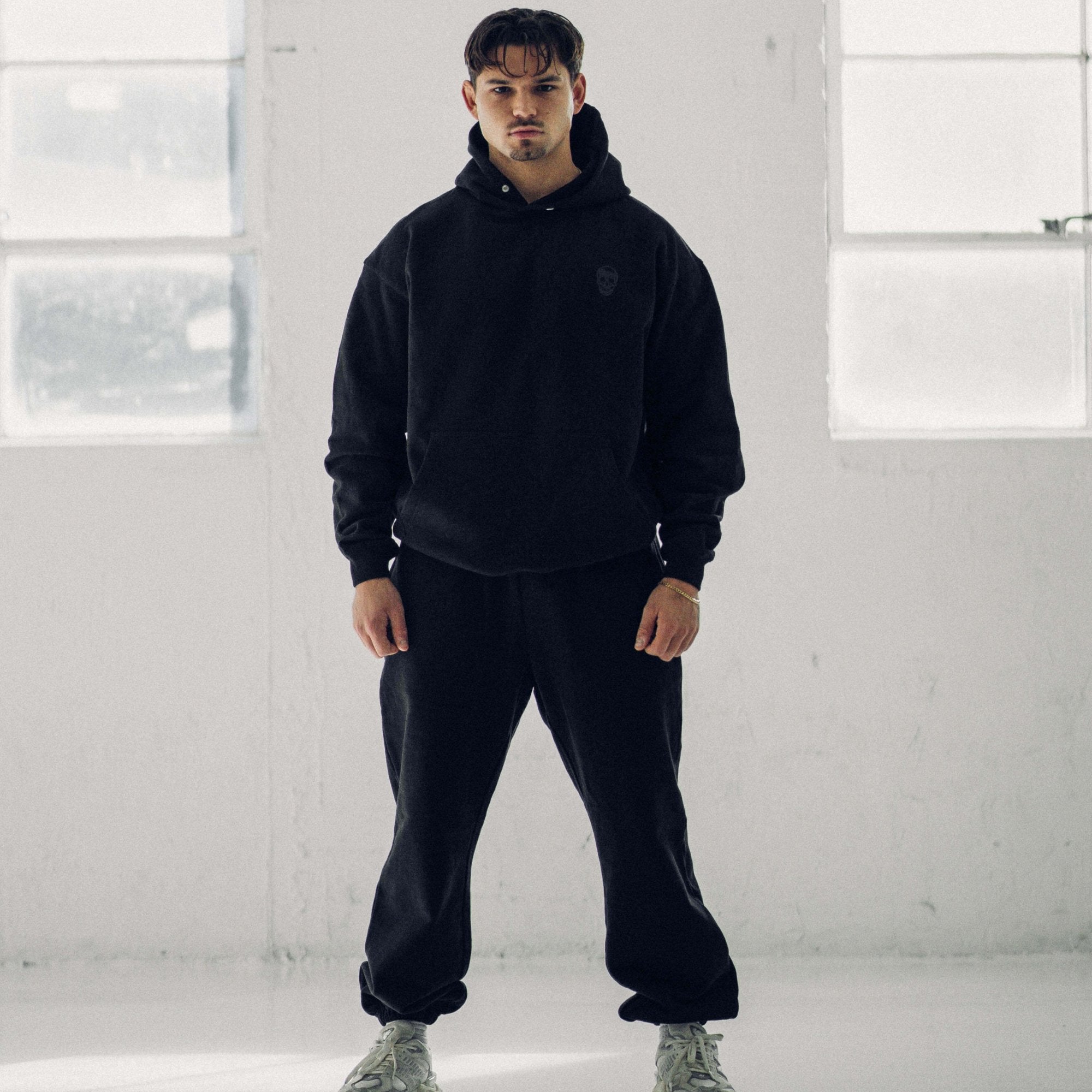 heavy weight joggers black black full front view lifestyle