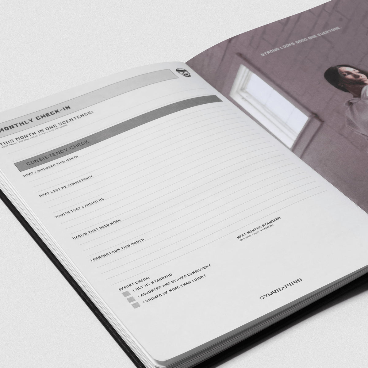 Women's Workout Journal in Black – Interior Page Detail, Monthly Check-In