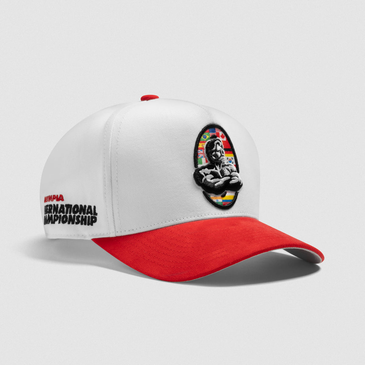 Front of International Division Suede 5-Panel Hat that shows the international Olympia Logo on the front and International Championship wordmark on the side
