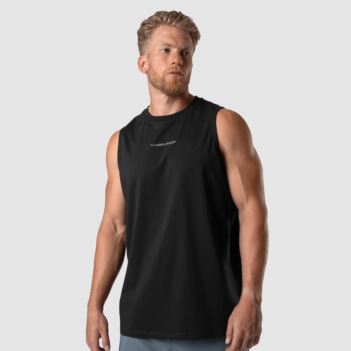 Man wearing Axis Muscle Tank - Black/White front fit