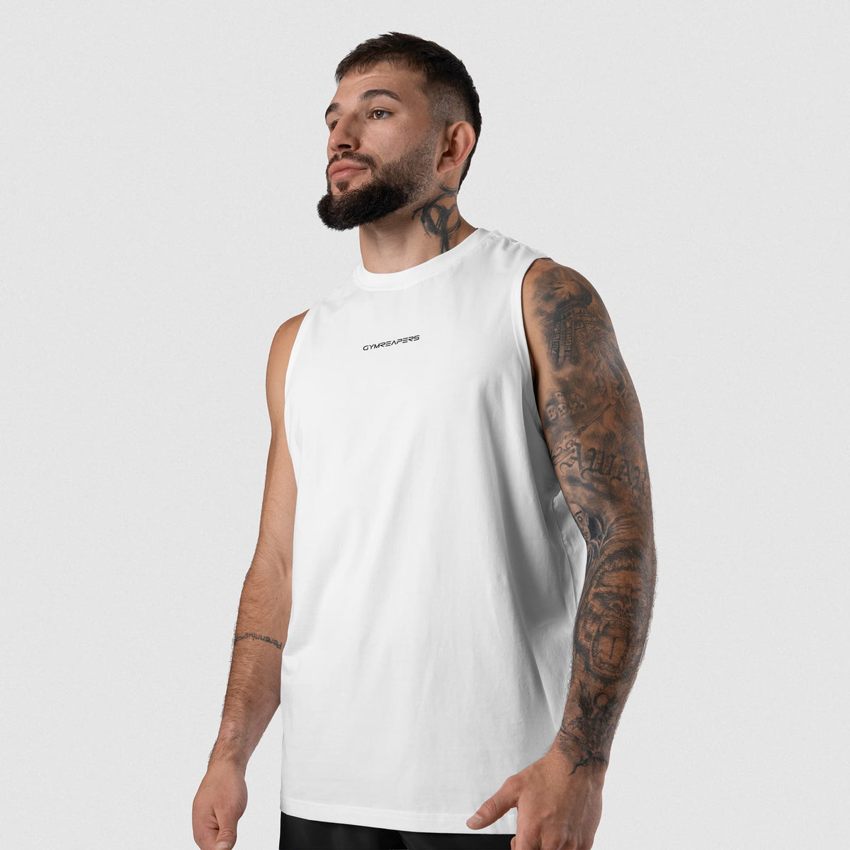 Man wearing Axis Muscle Tank - White front fit