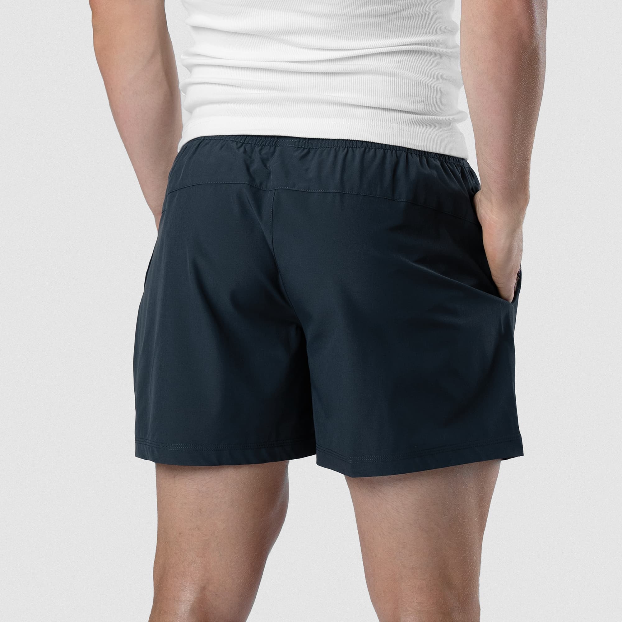 Back view of Men's Conquer 5 Inch Shorts on model - Navy