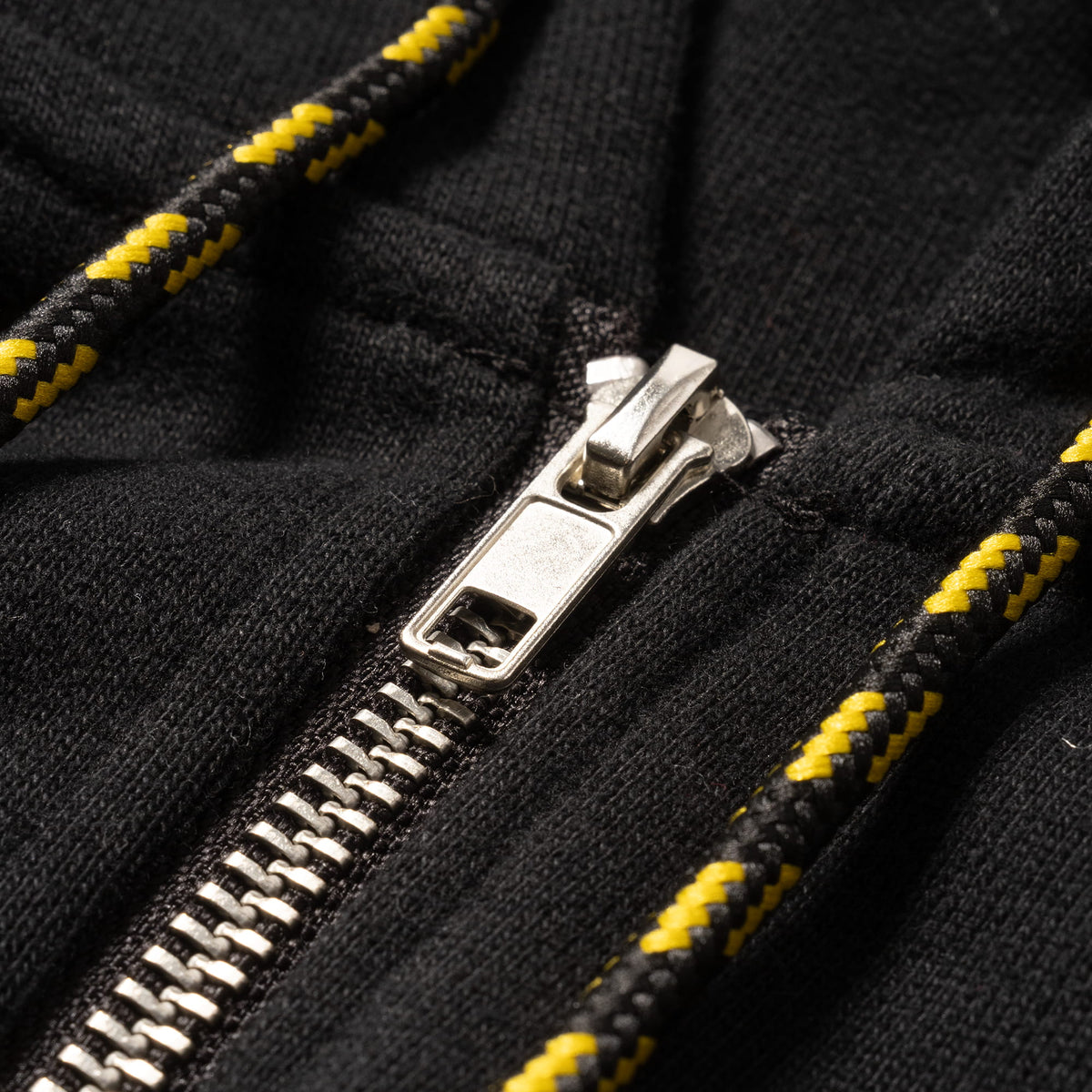 Champions Gold Cropped Zip-Up Hoodie | Close up of zipper detailing