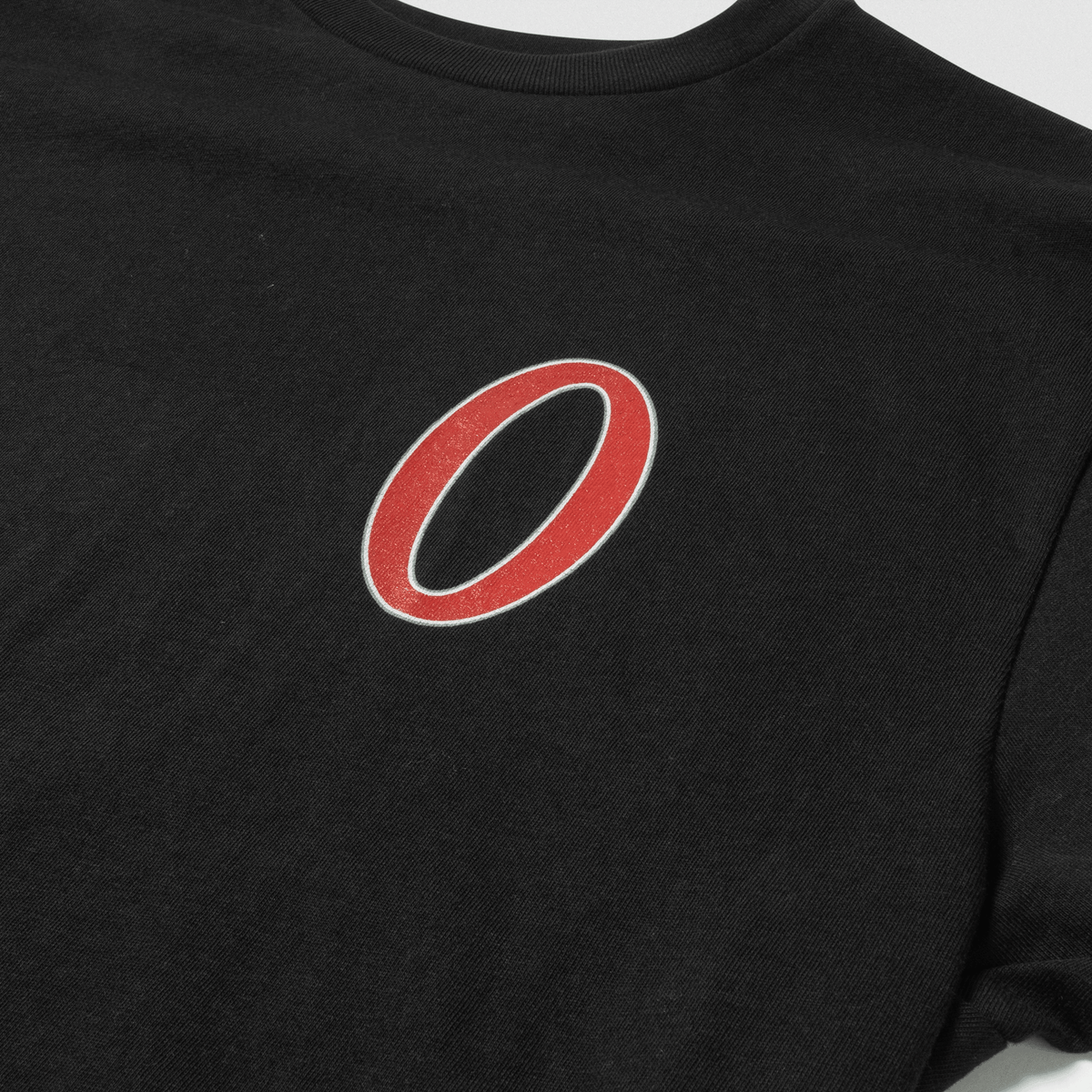 "O" Chest Logo Detail
