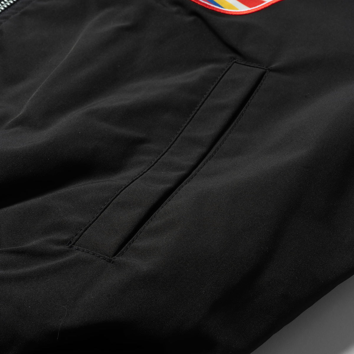 International Division Crop Bomber Jacket | Pocket detail and feature