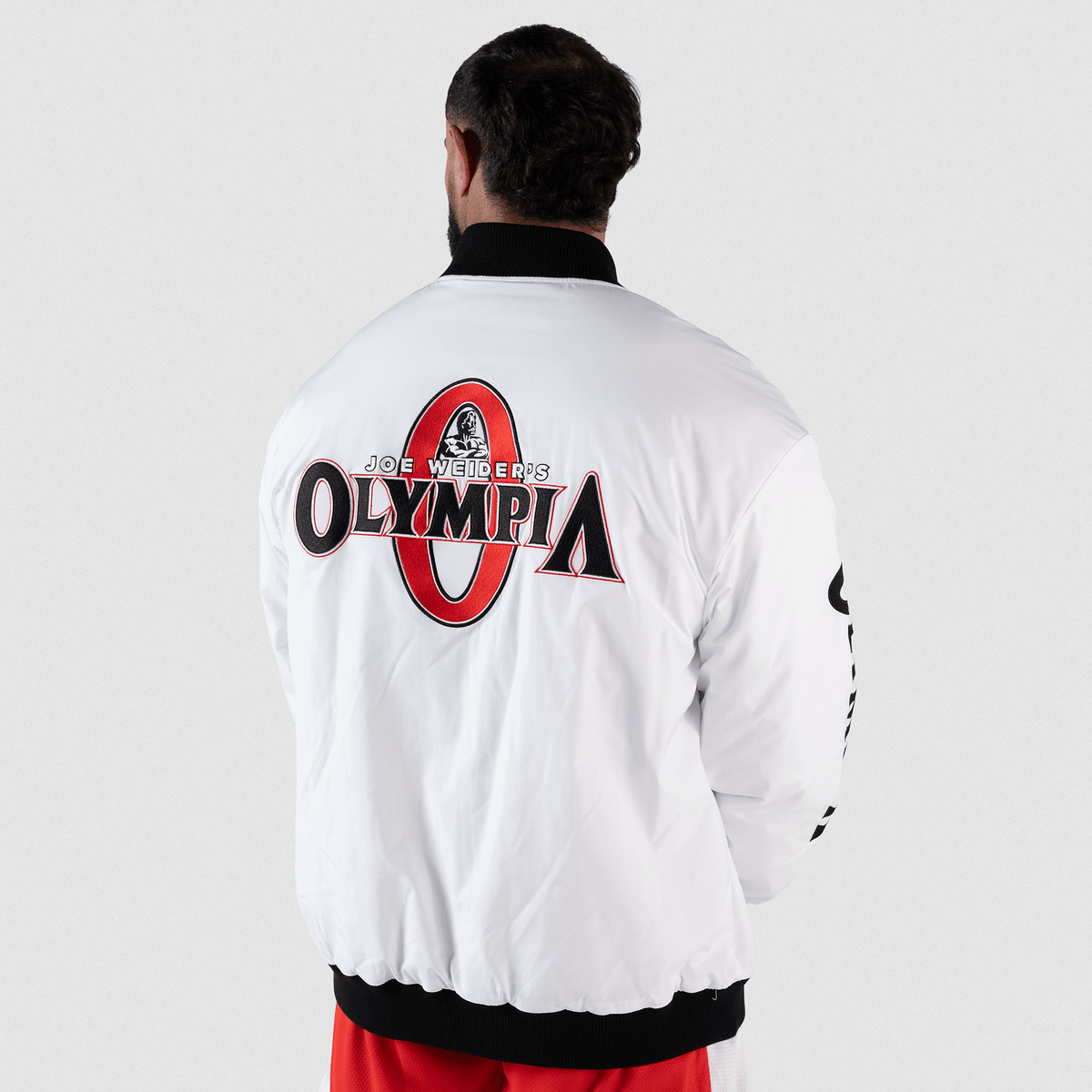 Olympia Signature Bomber Jacket in White – On Model, Back View