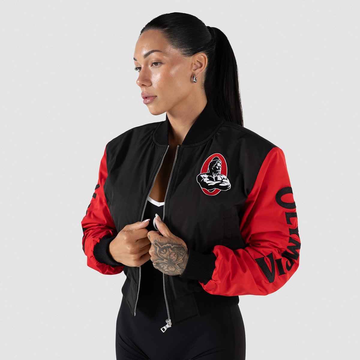 Signature Crop Bomber Jacket | Front view of model wearing the jacket with it fully unzipped