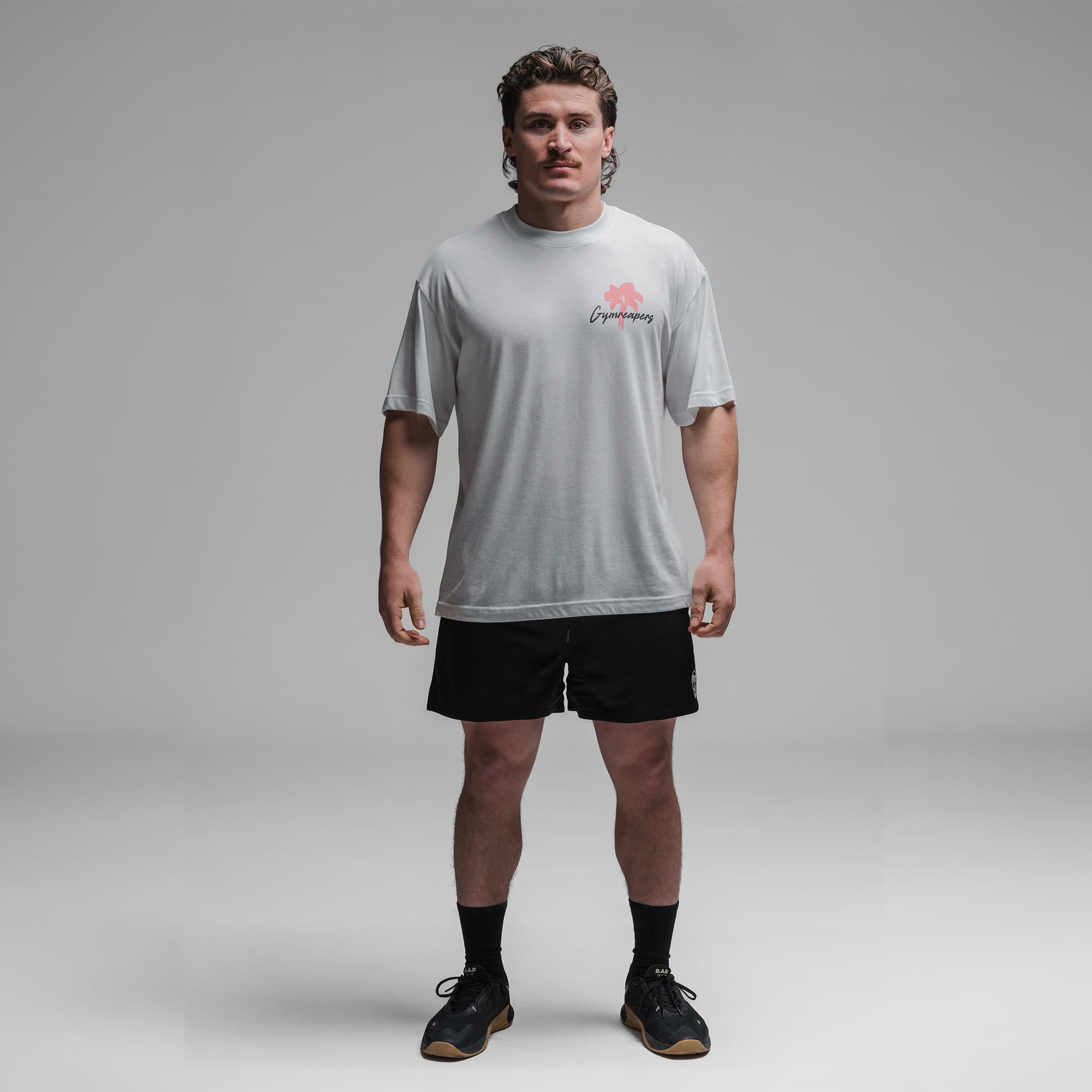 Athlete wearing the Greetings Tee full body shot front side