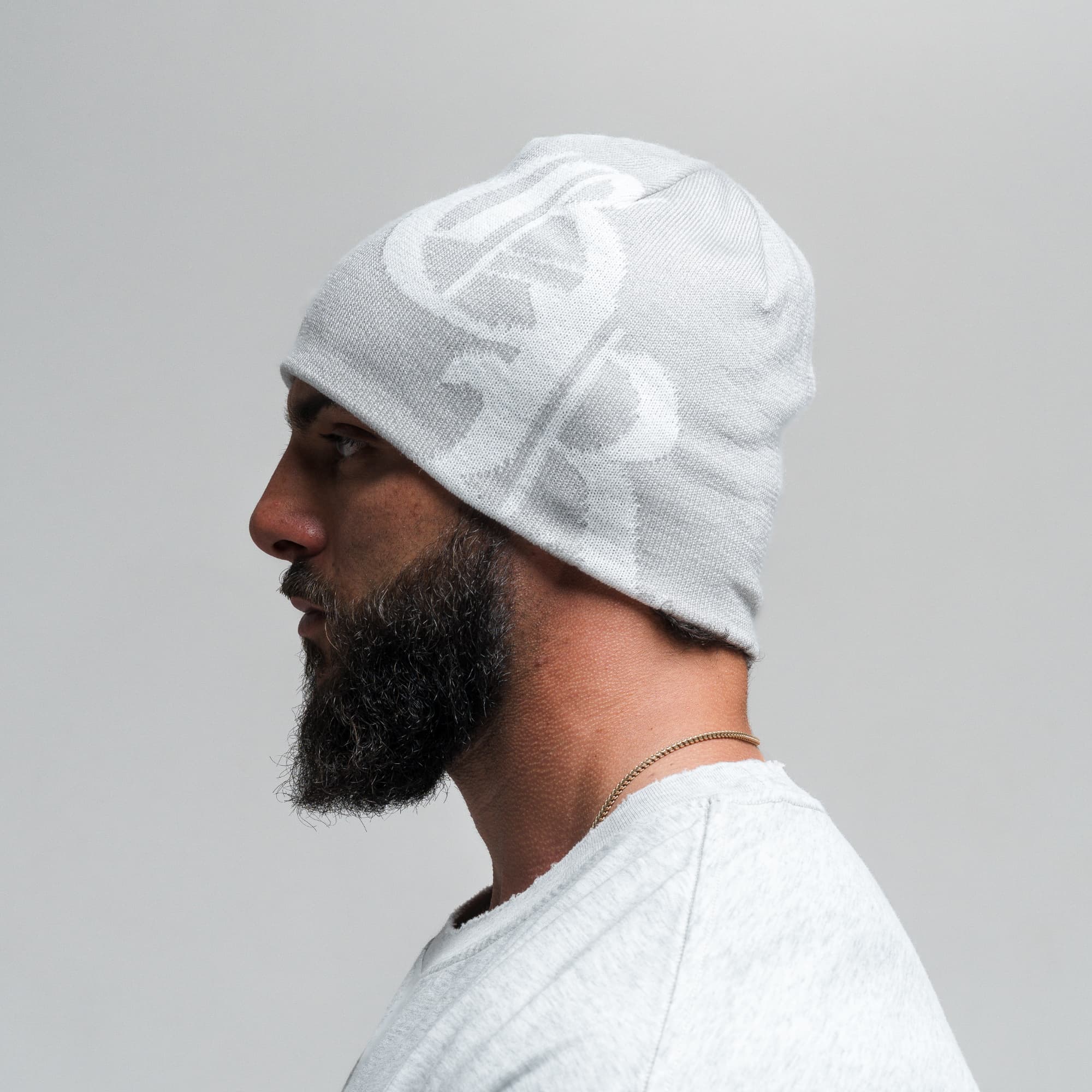 Athlete wearing Initial Skull Cap Beanie - Gray/White side view