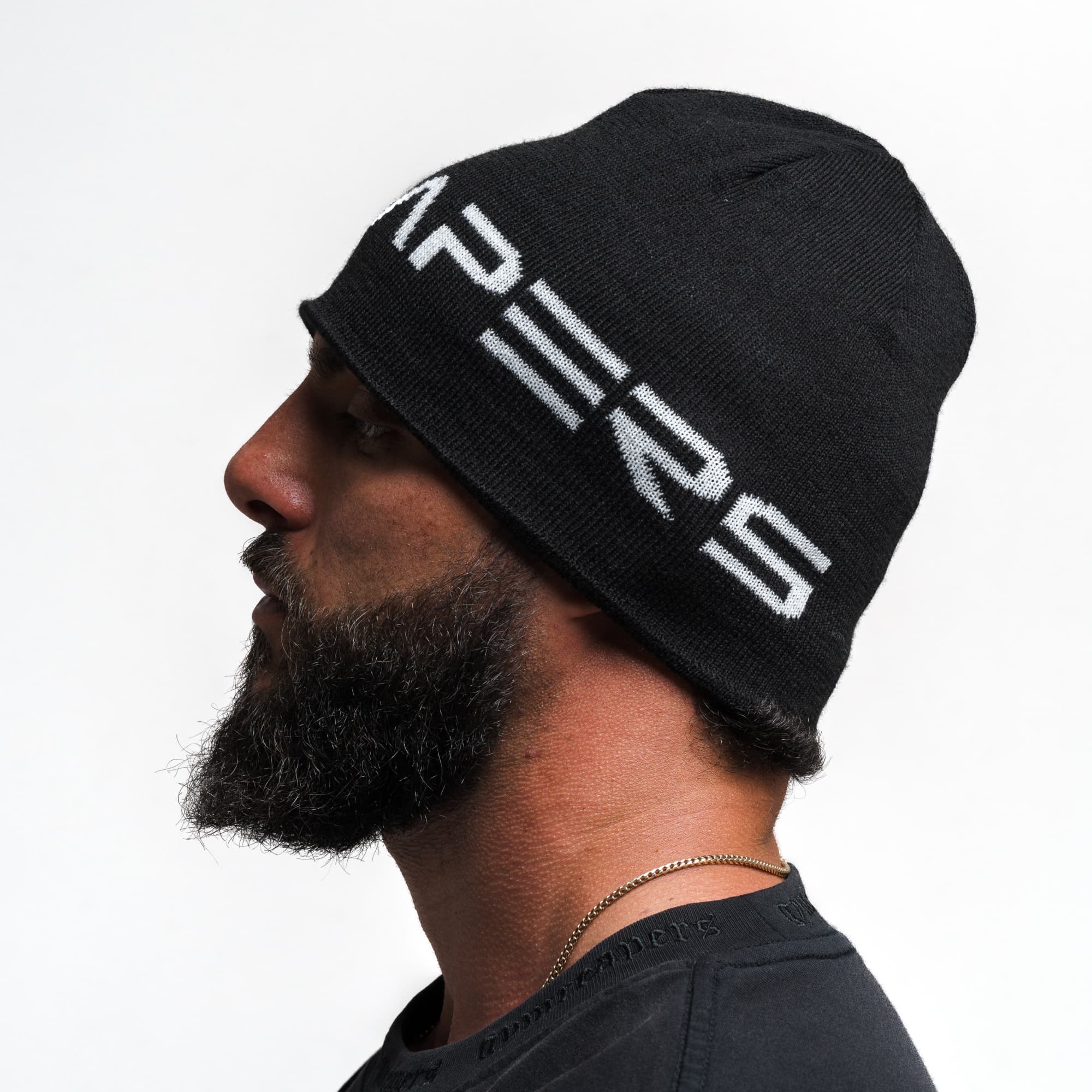 Athlete wearing Core Logo Skull Cap Beanie - Black side view