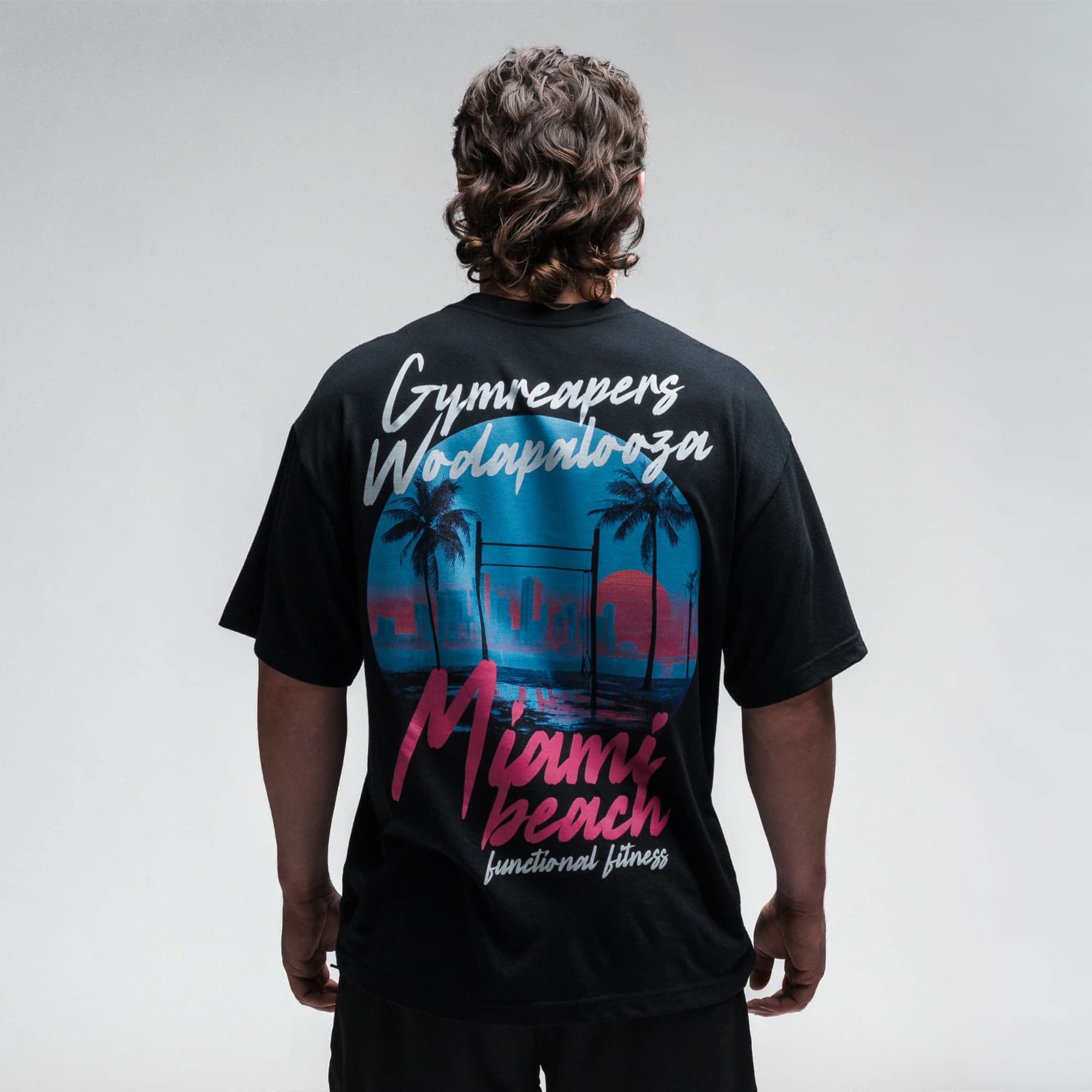 Athlete wearing the Skyline Tee half body shot back side