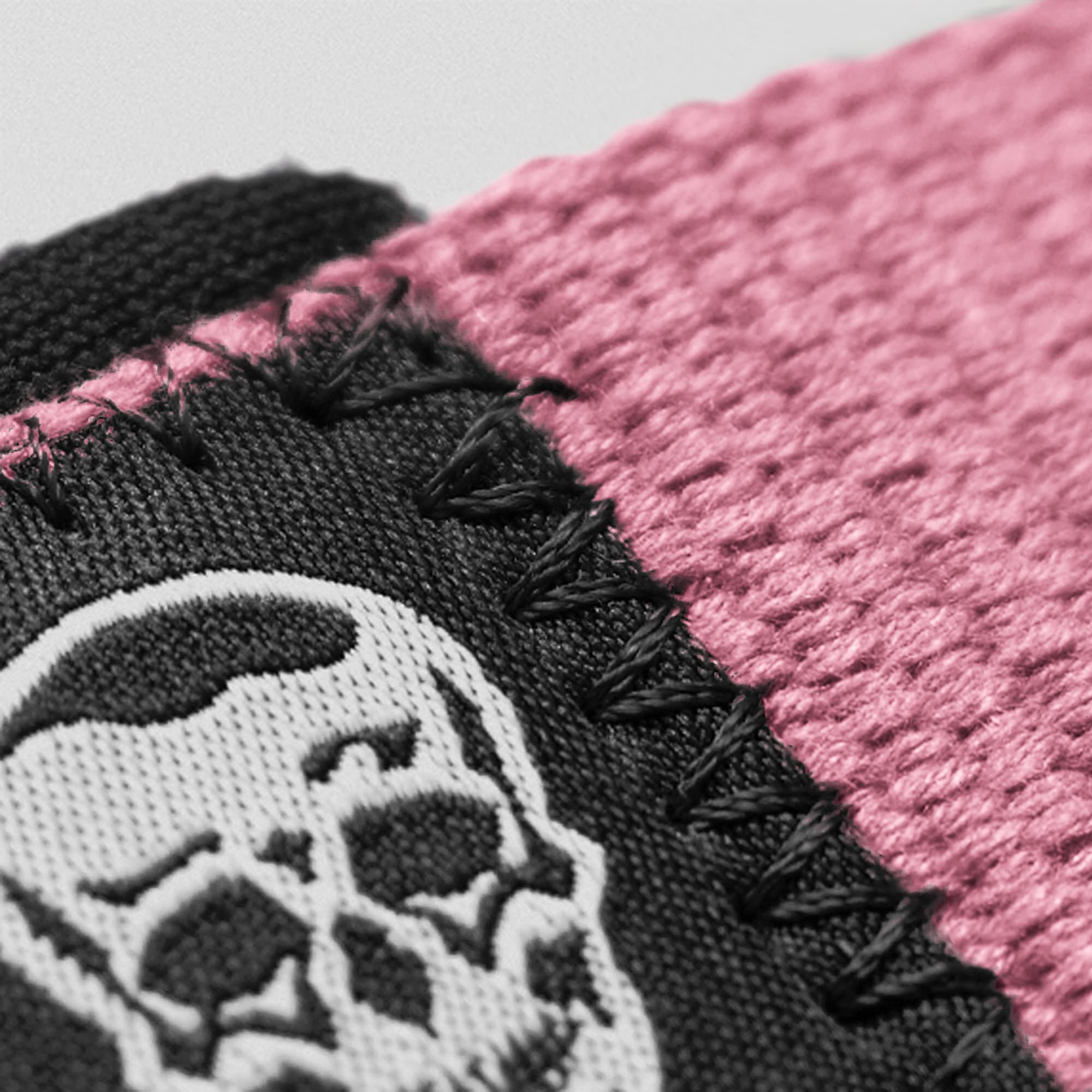 Light Pink Lifting Straps close up detail shot of skull