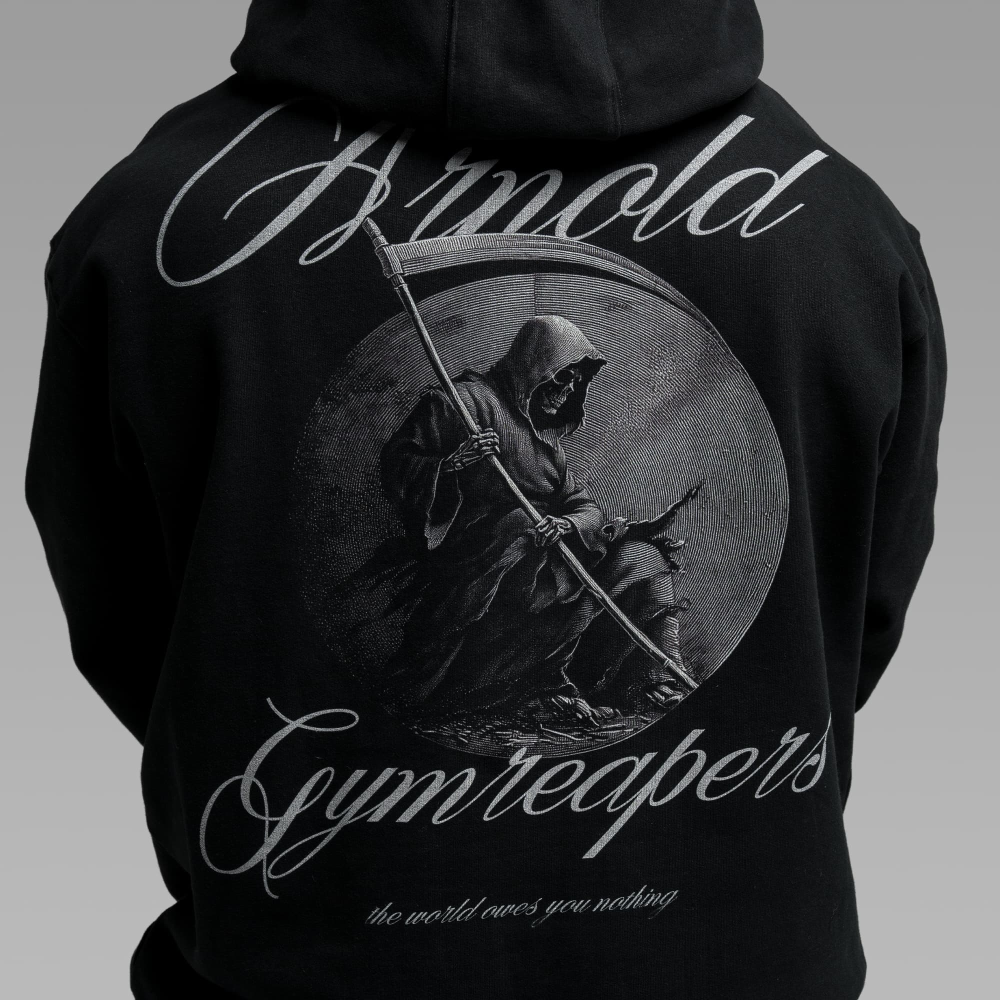 Athlete wearing Midnight Reaper Hoodie close up shot of back graphic
