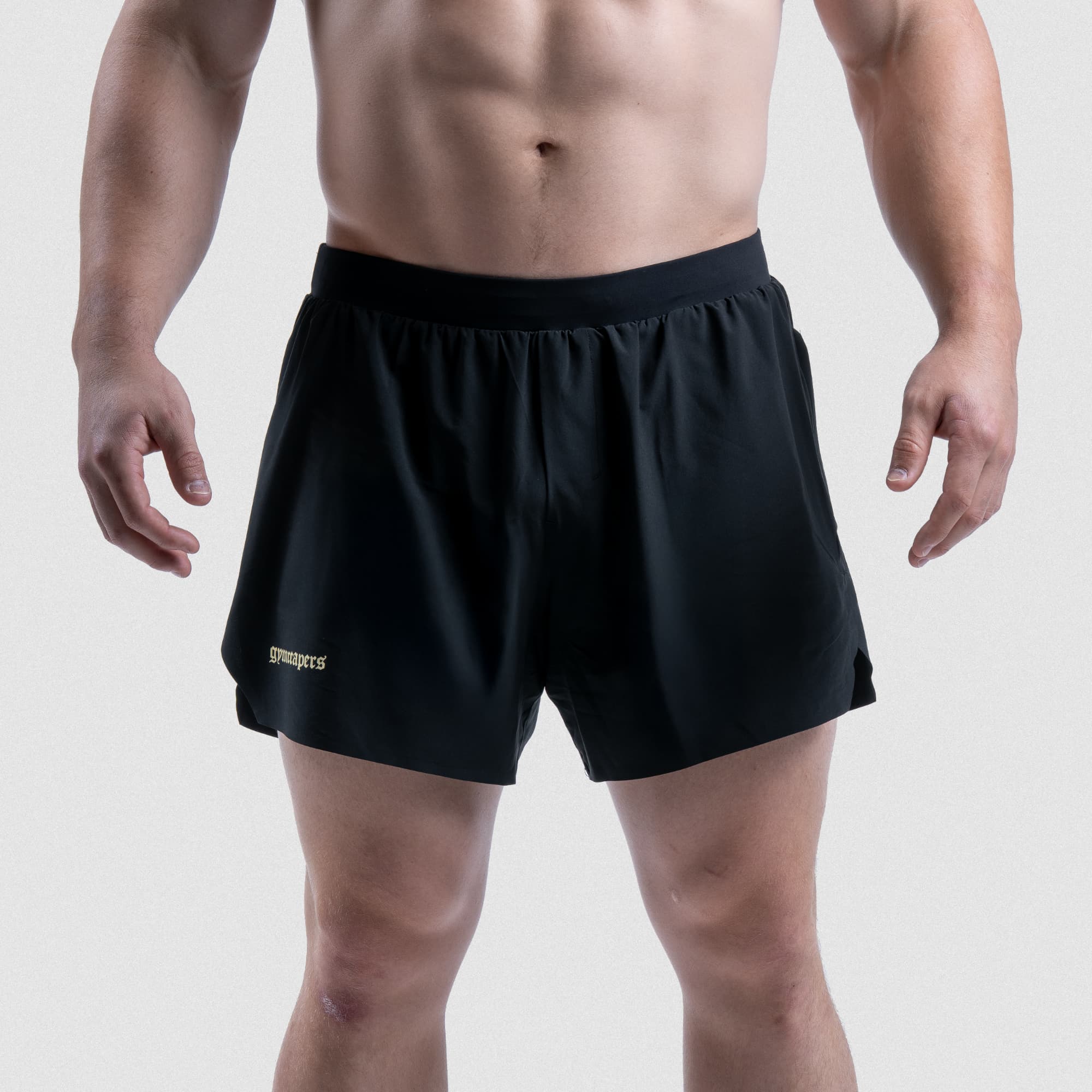 Front view of Master the Soul Gymreapers running shorts worn by athlete, featuring minimalist branding
