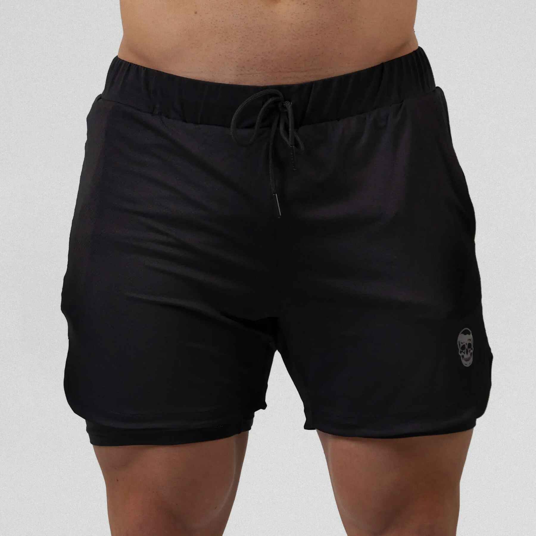 Gymreapers react training shorts black color way on athlete showcasing the front.