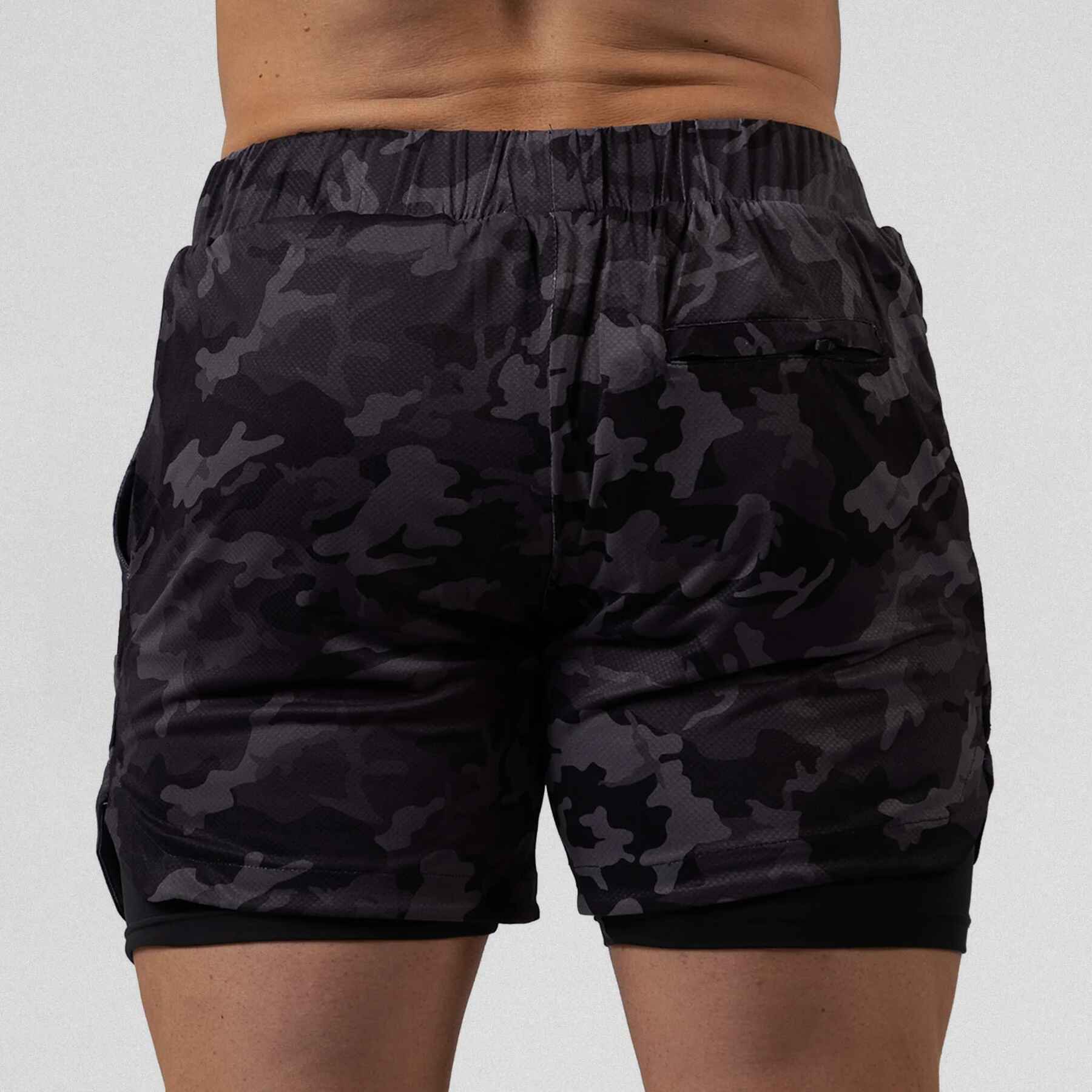 Gymreapers React training shorts midnight camo color way on athlete showcasing the back of the shorts.
