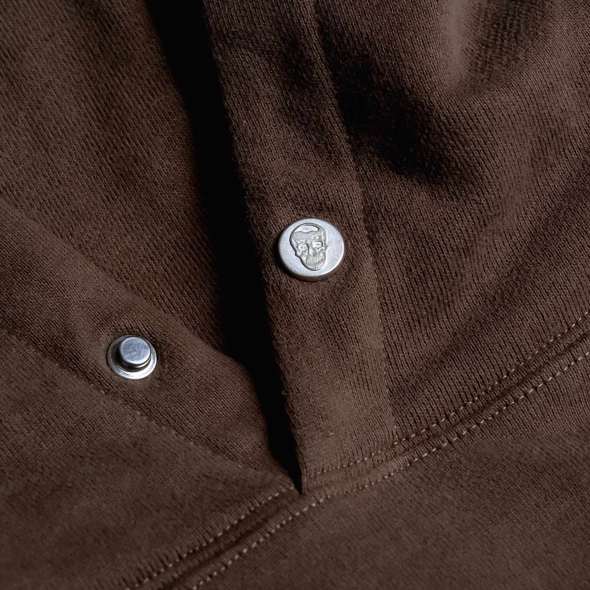 Toffee Heavyweight Hoodie lay flat detail shot of branded buttons