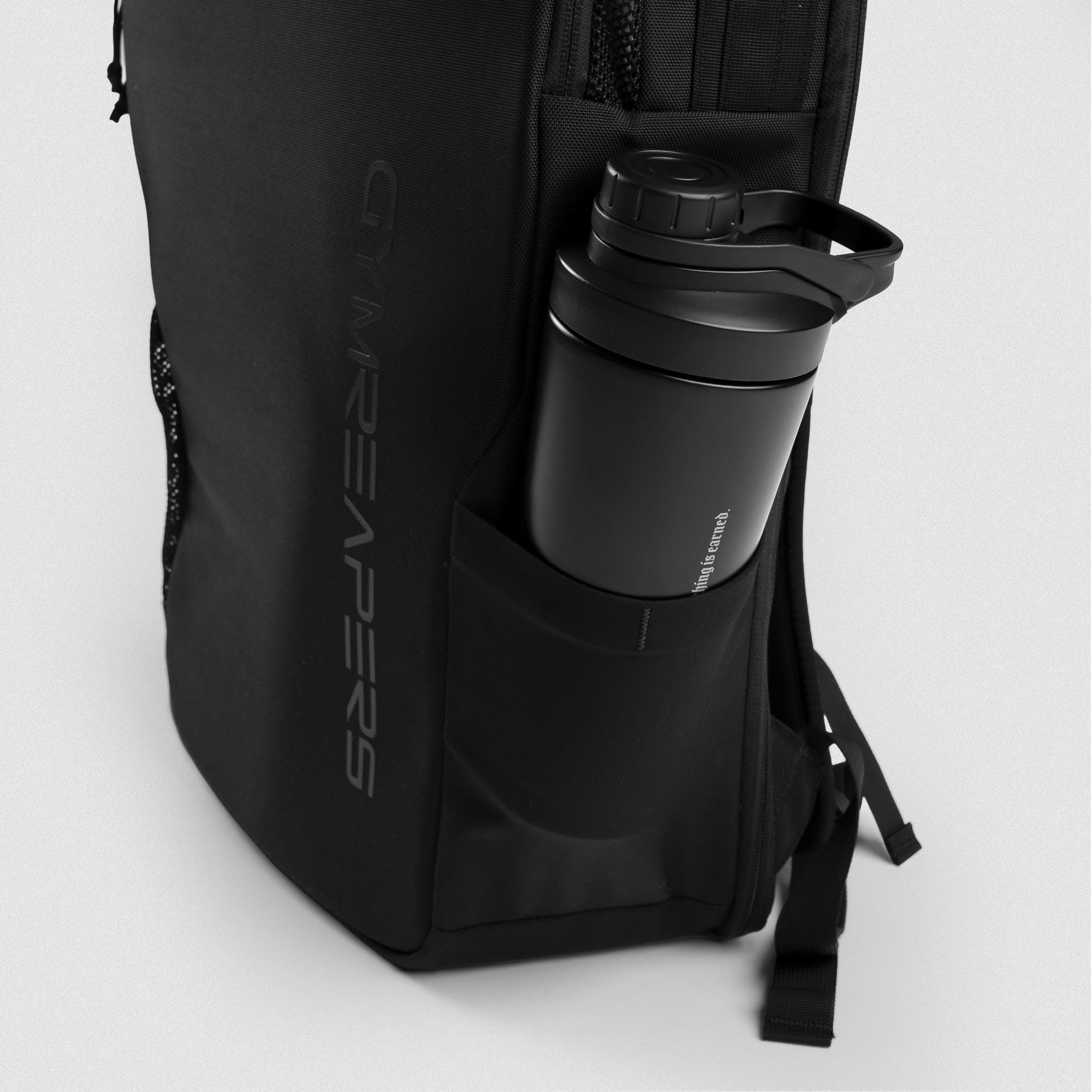 Close up shot of shaker bottle in bottle sleeve of Vanguard™ Backpack