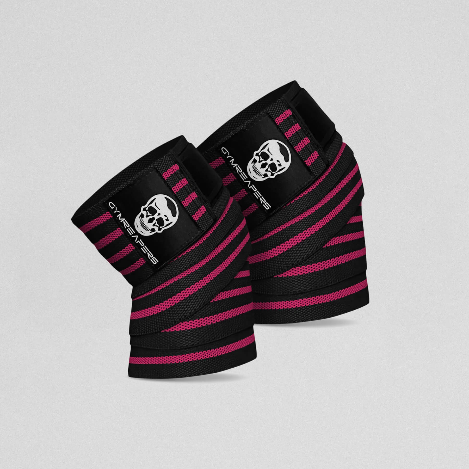 Gymreapers Knee Wraps in the pink colorway close up shot.