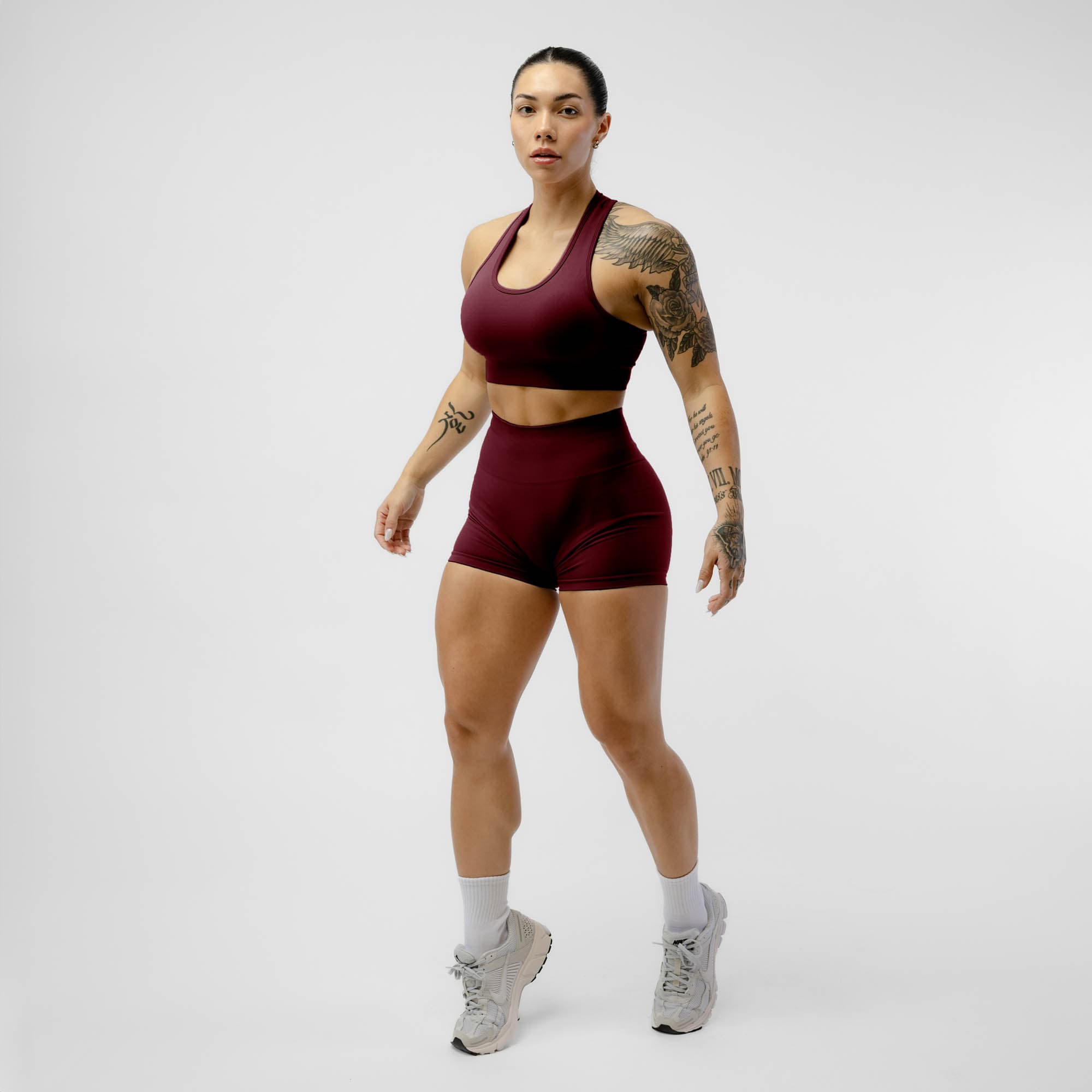 Athlete wearing the Wine Halo Shorts full body shot
